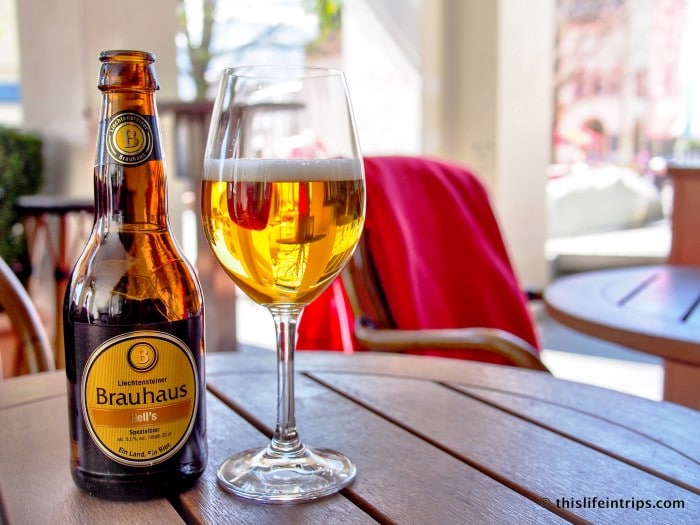 1 day in Liechtenstein itinerary - enjoying a bottle of beer