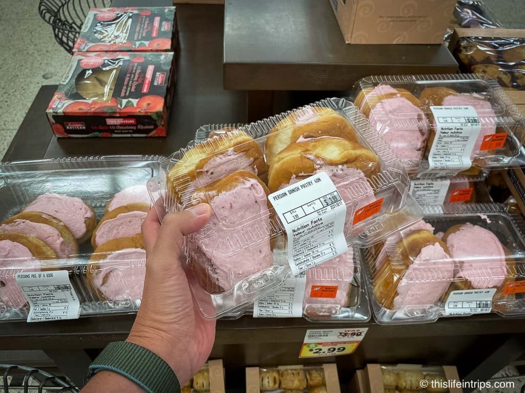 What and where to eat Thunder Bay - Persian pink roll package of 6 held up in front of other packages in grocery store