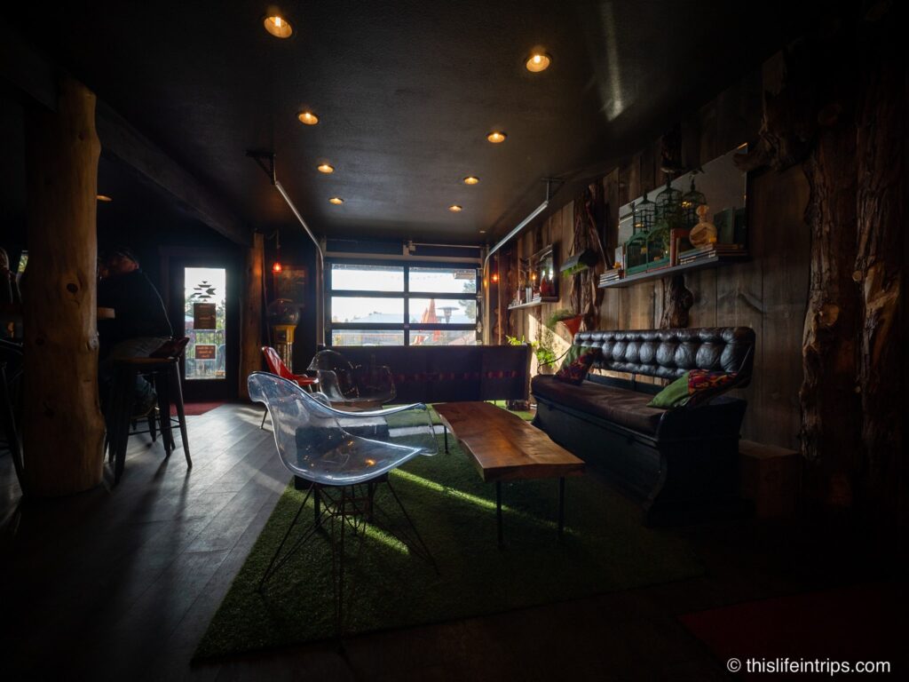 wide shot of Canteen Bar with garage door style window in the background