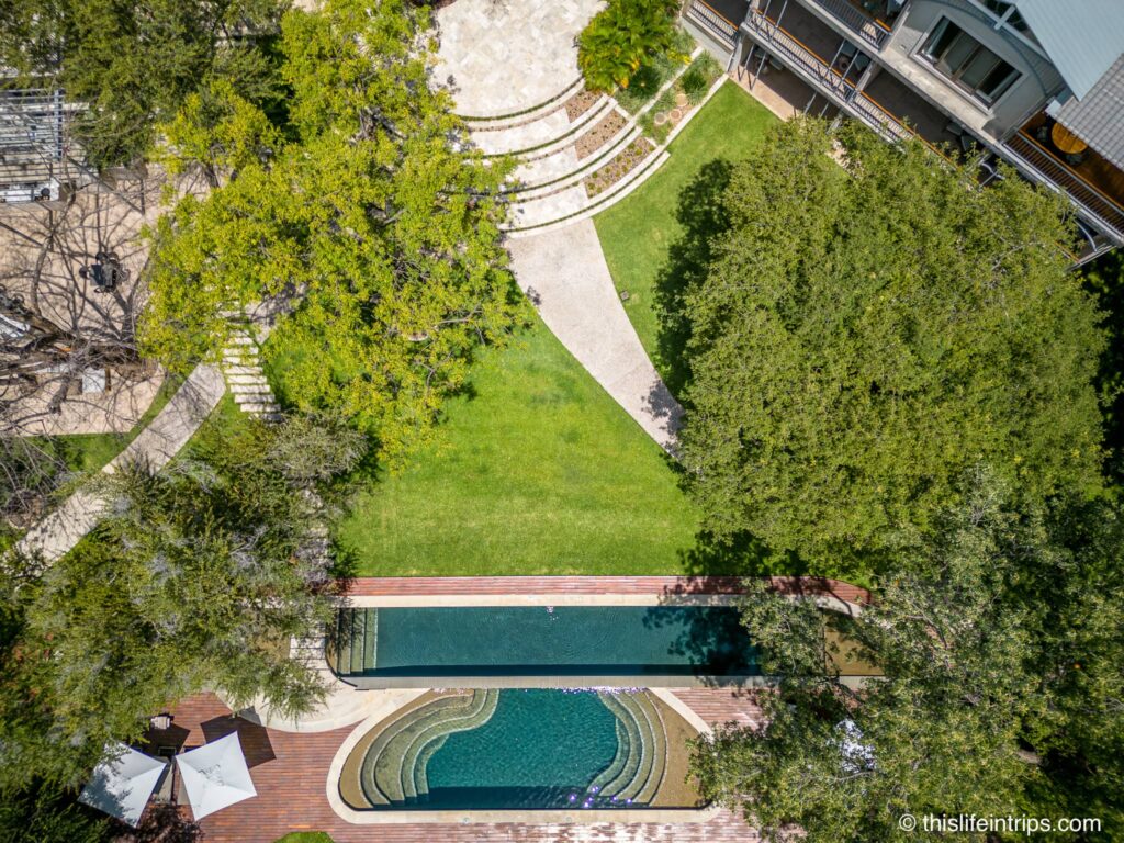 Drone arial shot looking straight down at the pool at the Palm River Hotel Victoria Falls