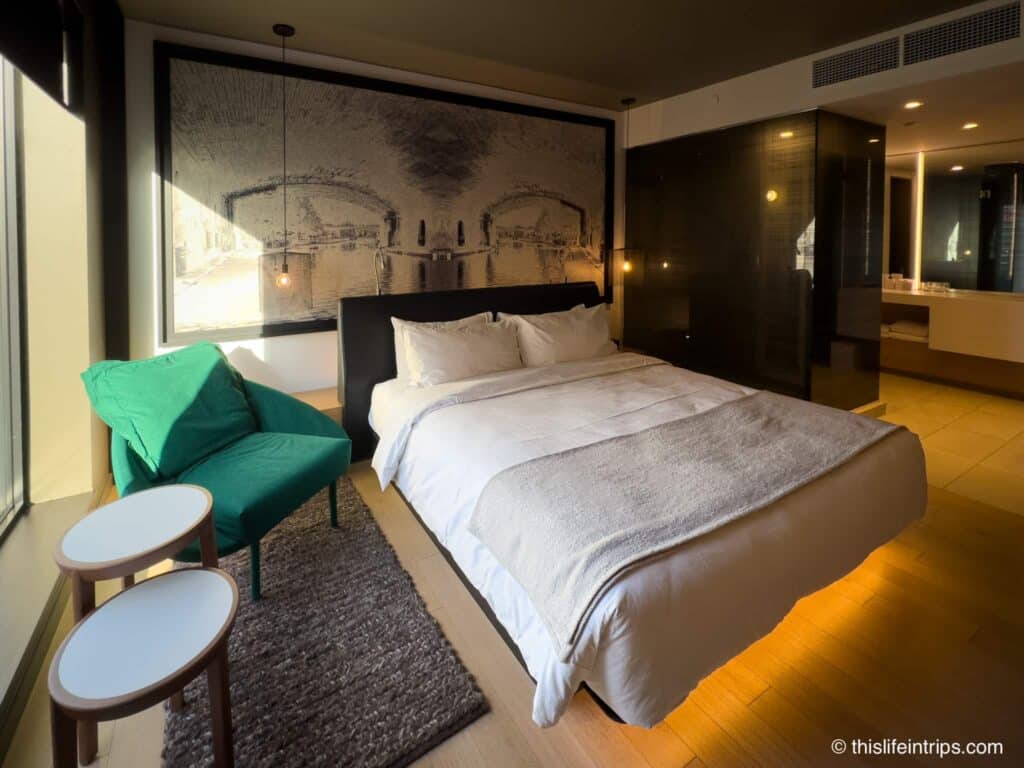 Cozy bed in a Le Germain Ottawa room