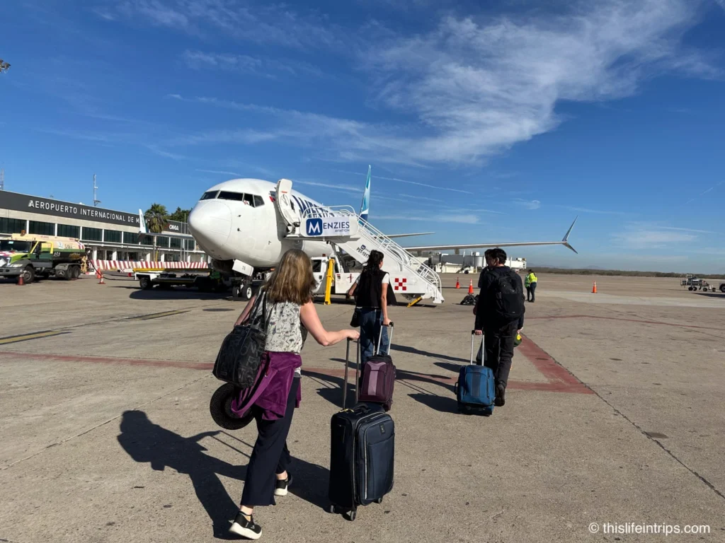 Boarding Westjet UltraBasic from tarmac in Mazatlan, Mexico