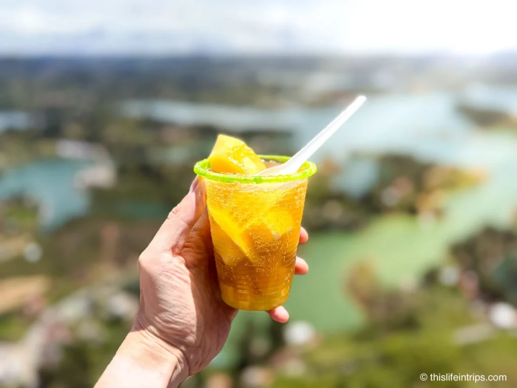 Hand holding a Mango Michelada