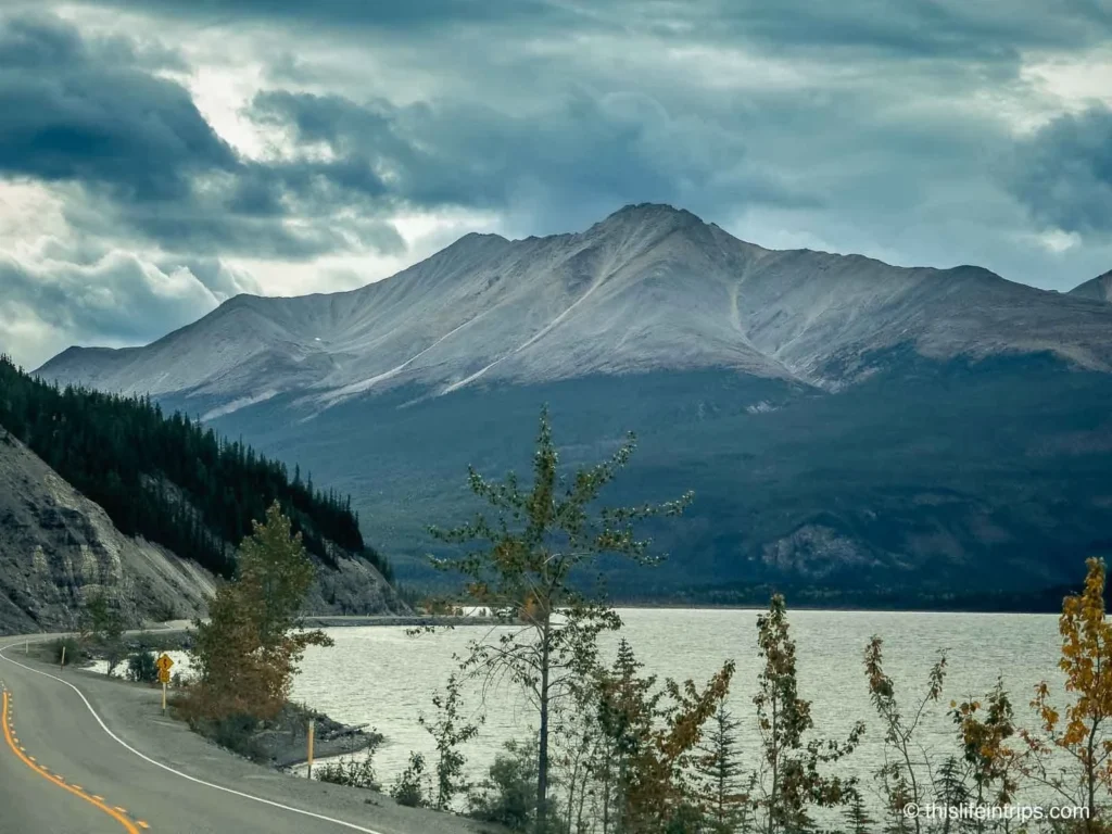 Mountain and lake scenery on the highway to the Liard Hot Springs