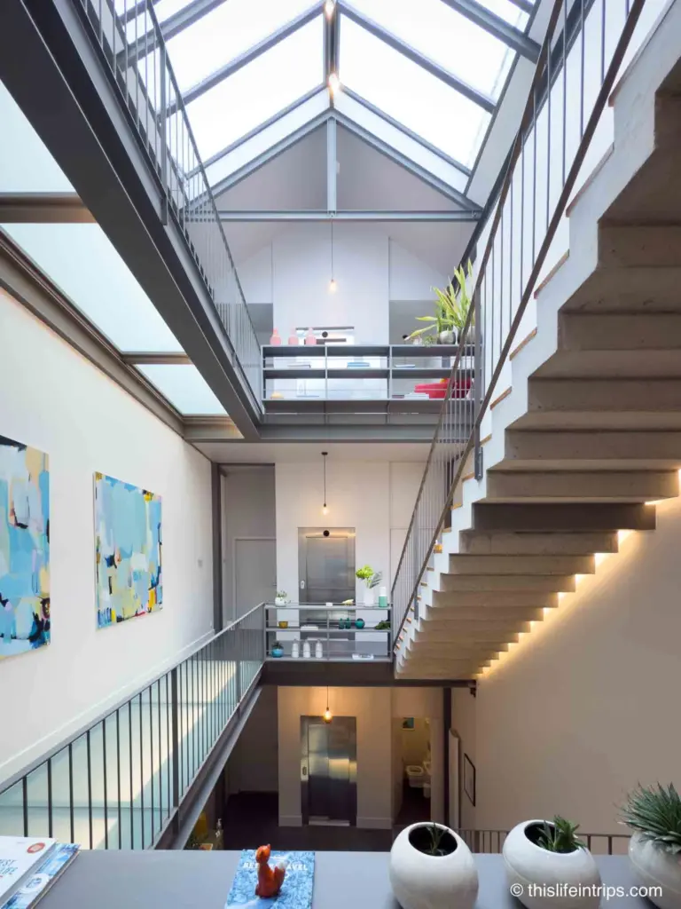 Canto de Luz stairwell with beautiful artwork and decor